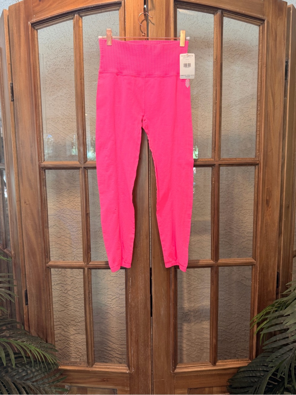 Free People Neon Pink High-Waist Leggings with cut outs down the back